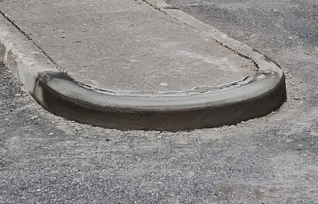 Curb restabilization corner detail