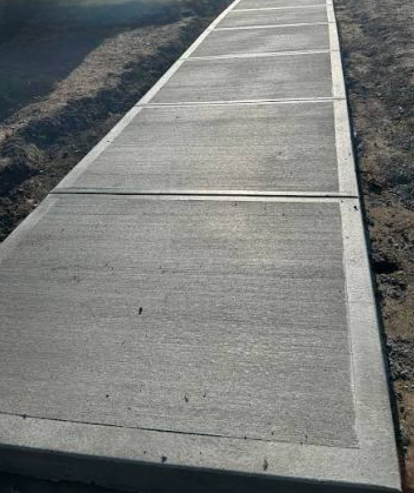 Fresh concrete sidewalk restoration
